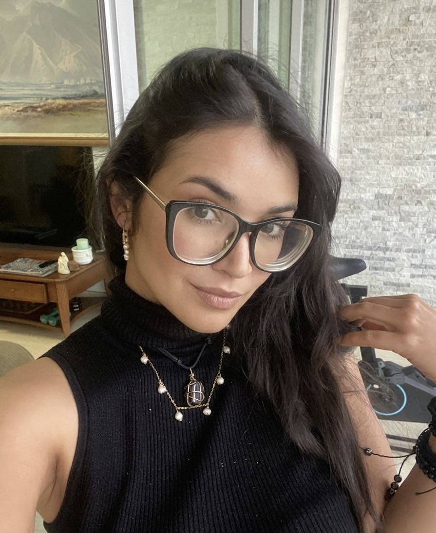 Woman at home deciding how she wants to start a video chat